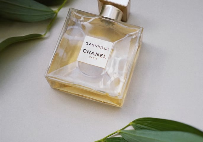 perfume bottle laying flat with Gabrielle Chanel on front